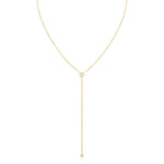 A Diamond Drip Necklace in yellow gold on a white background. 