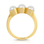 A Tres Pearl Ring on a white background. 